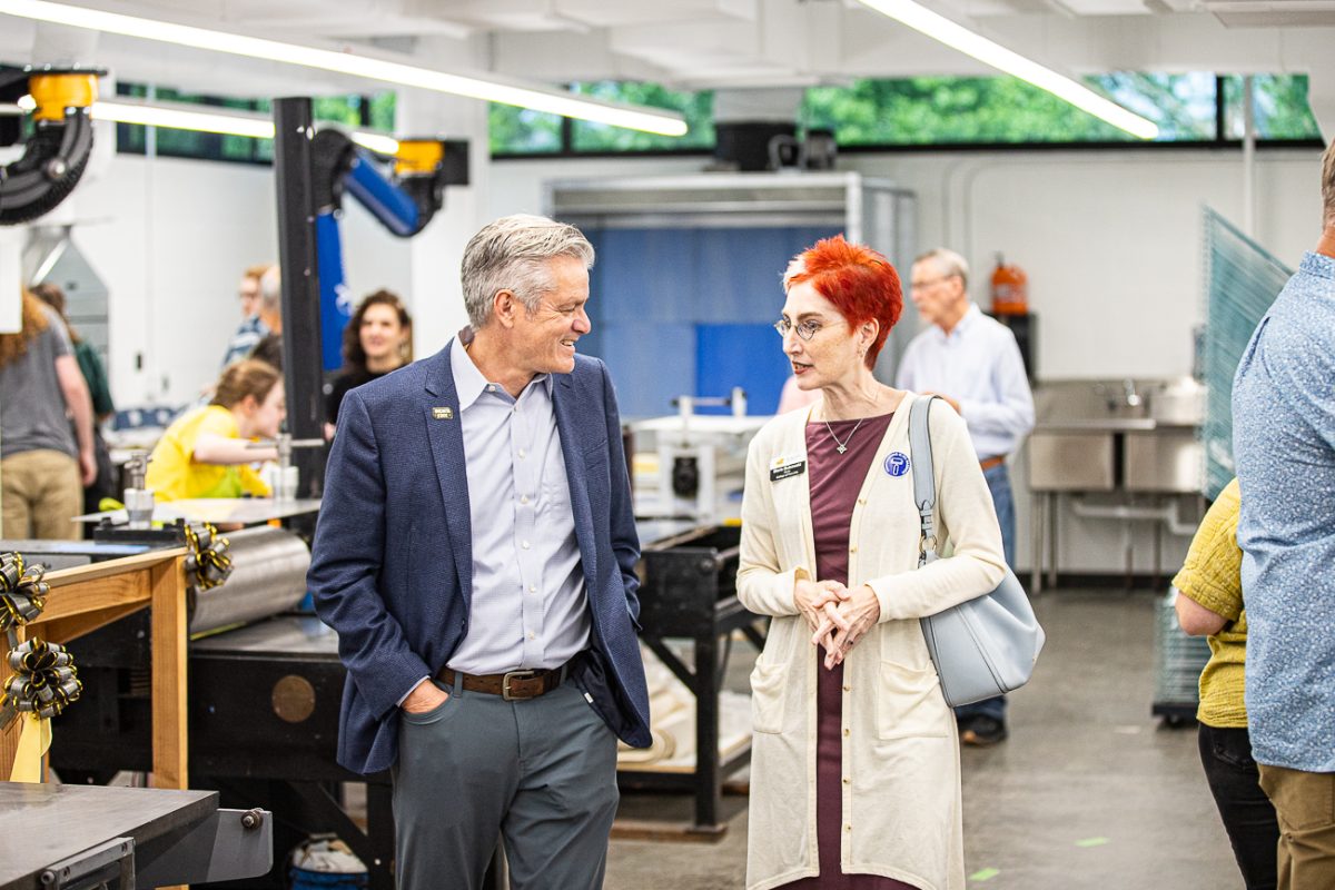 University President Richard Muma speaks to Dean of the College of Fine Arts Marie Bukowski. Muma is the 15th president of Wichita State University since 2021.