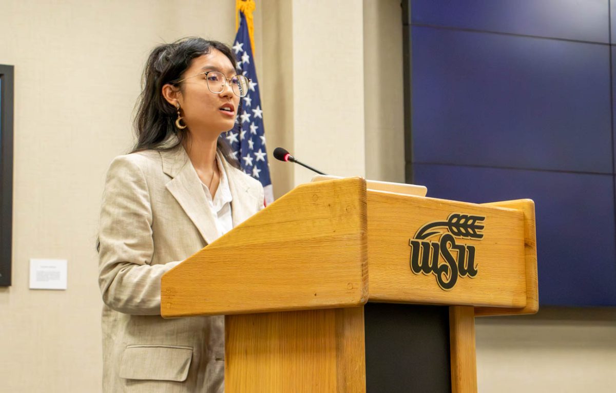 Student Body President Jia Wen Wang presents SB-68-113. The act discusses a proposed legal services program for students to access.