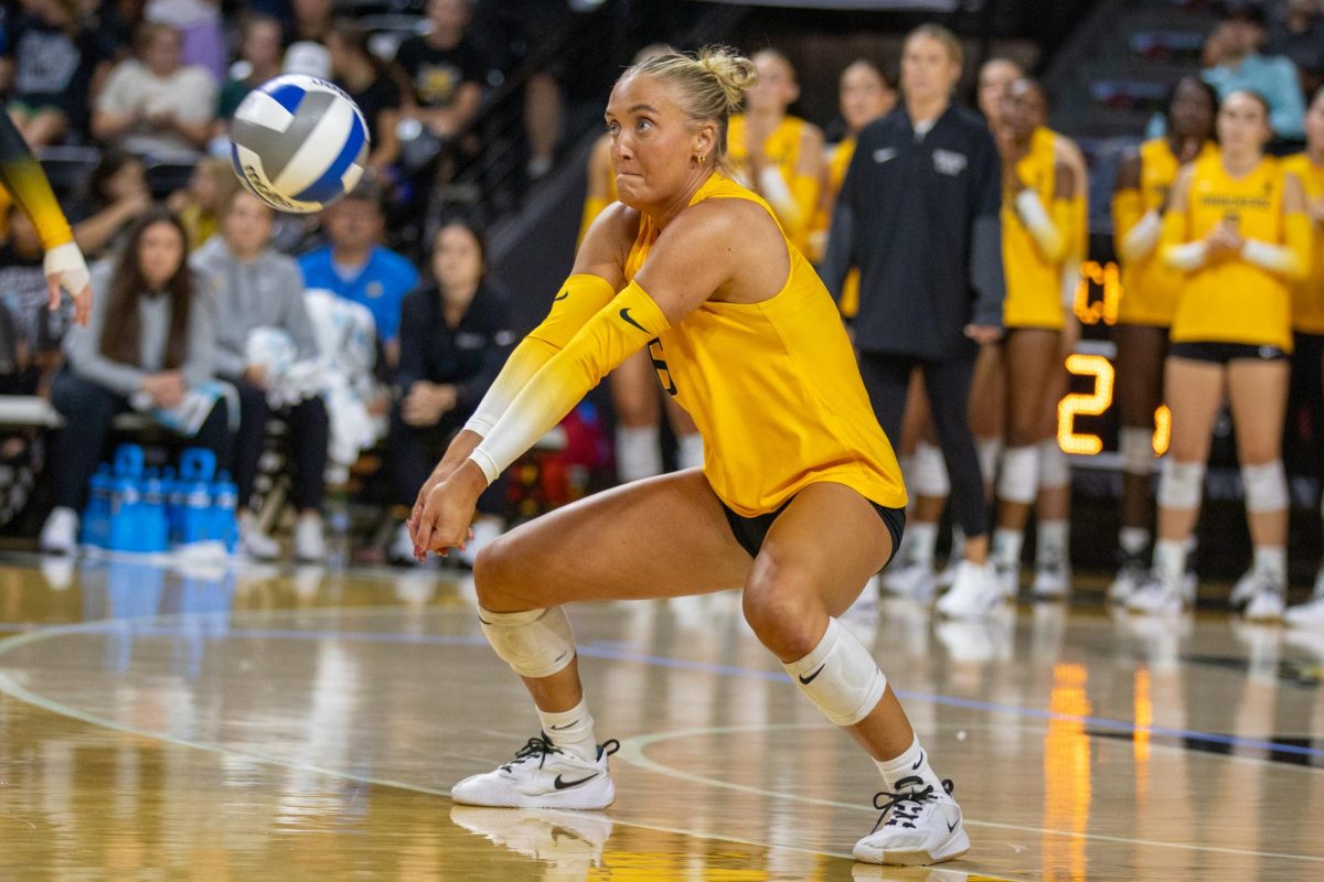 Senior Katie Galligan digs the ball on Sept. 16. Galligan made eight digs against No. 17 Kansas.
