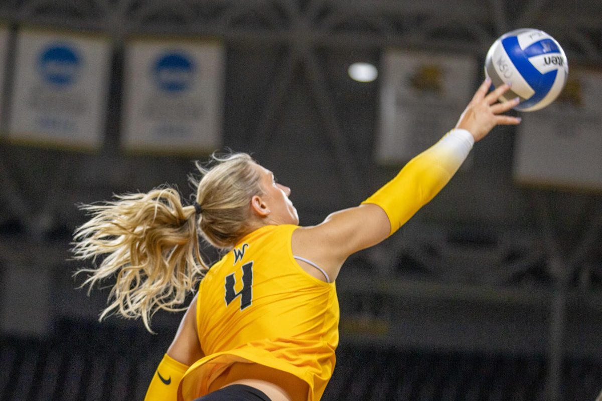 Senior Brooklyn Leggett reaches for the ball on Sept. 16. Wichita State lost to No. 17 Kansas, 3-0.