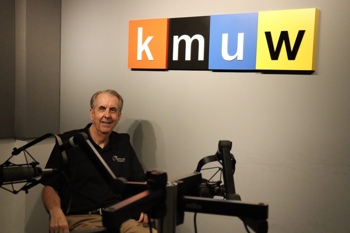 Tom Shine, director of News and Public Affairs, in one of the KMUW recording studios. Shine's radio show, The Range, airs every Friday.
