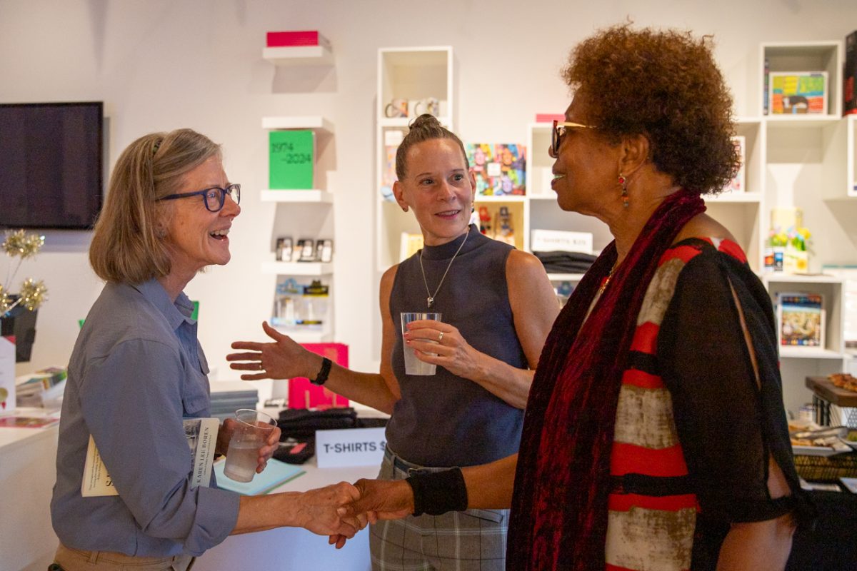 Peg Flynn, Karen Lee Boren and Chinyere Okafor introduce each other during the reception. Karen Lee Boren was the reader for a fiction reading event on Sept. 23.