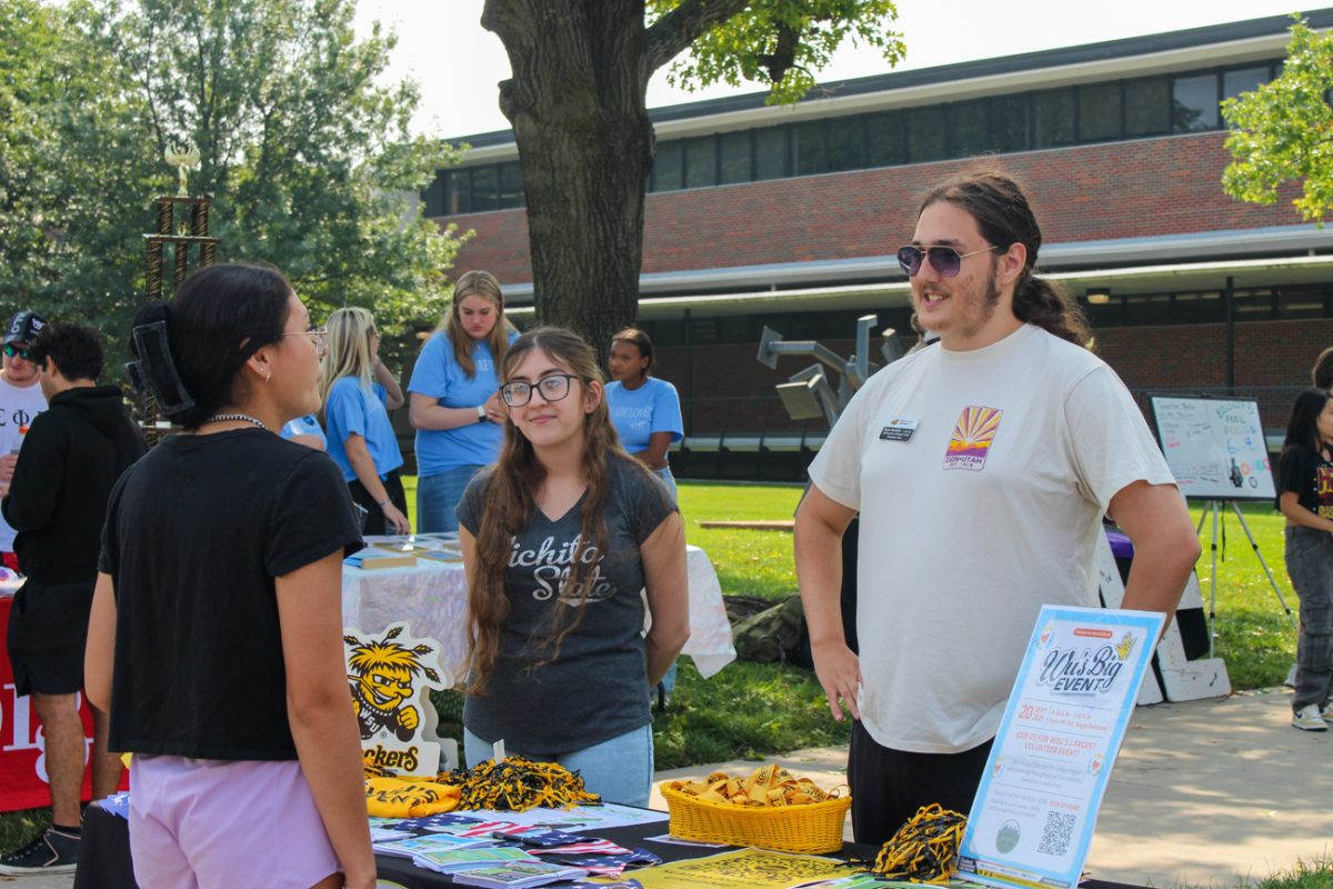 Shockers Vote tables for potential members at Involvement Fair hosted by Student Engagement and Belonging. The event is hosted yearly and presents an opportunity for students to see what different student organizations offer. 