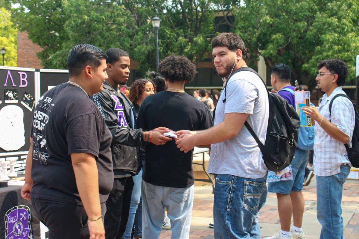 Sigma Lambda Beta tables for potential members at Involvement Fair hosted by Student Engagement and Belonging. The event is hosted yearly and presents an opportunity for students to see what different student organizations offer. 