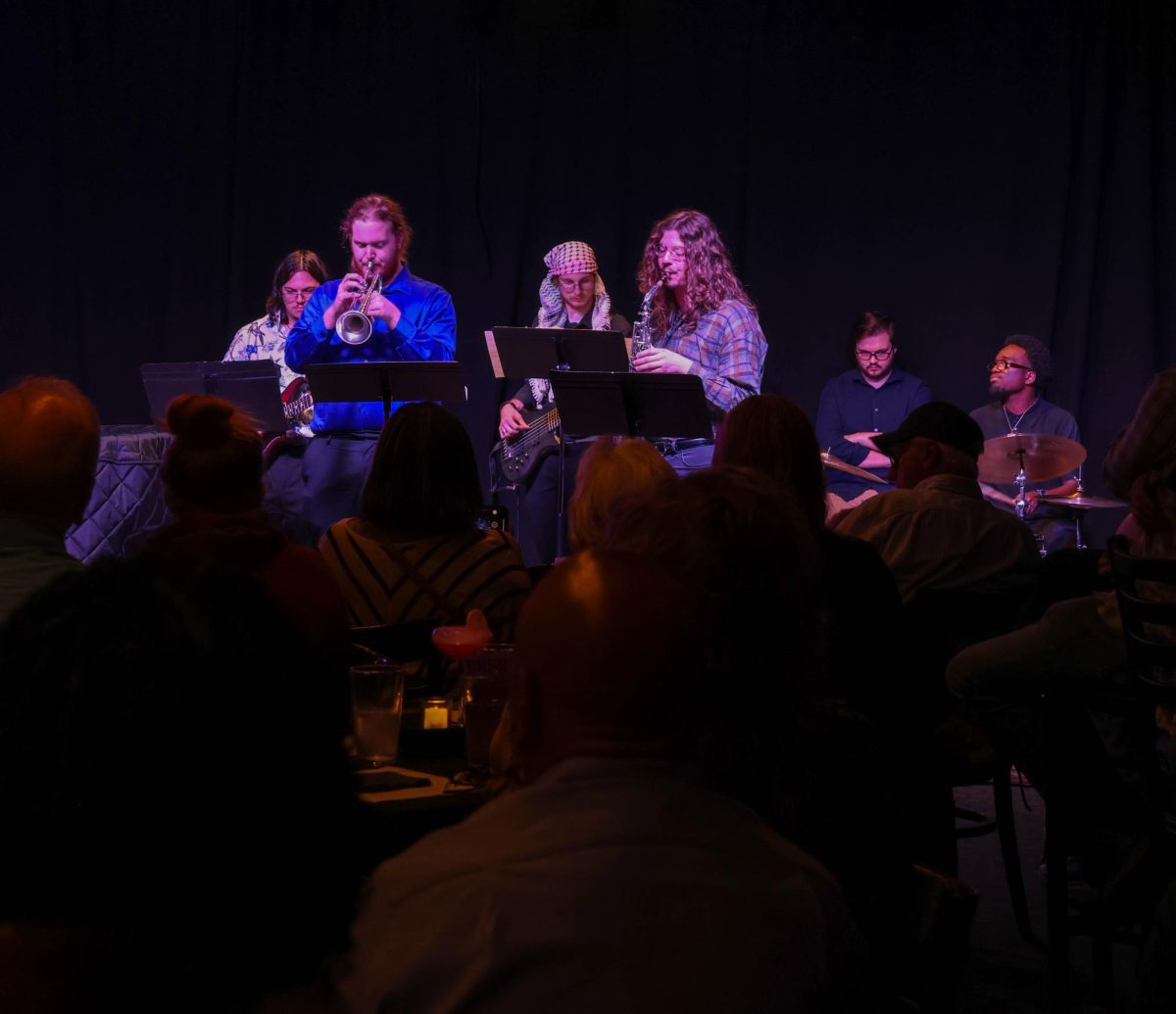 A walker's Jazz Lounge crowd listens to a performance by Wichita State's Latin Jazz Combo on Sept. 21. Student's could enjoy a night of jazz for only five dollars with their Shocker I.D.