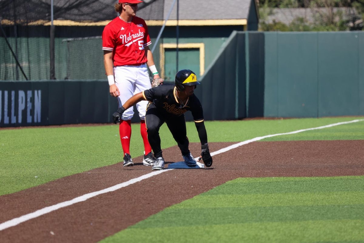 Junior Kaleb Duncan (26) tags up for a flyball on Saturday, Sept. 27, 2025, at Eck Stadium in Wichita, Kansas. Duncan scored 11 times last season for Wichita State's baseball team.