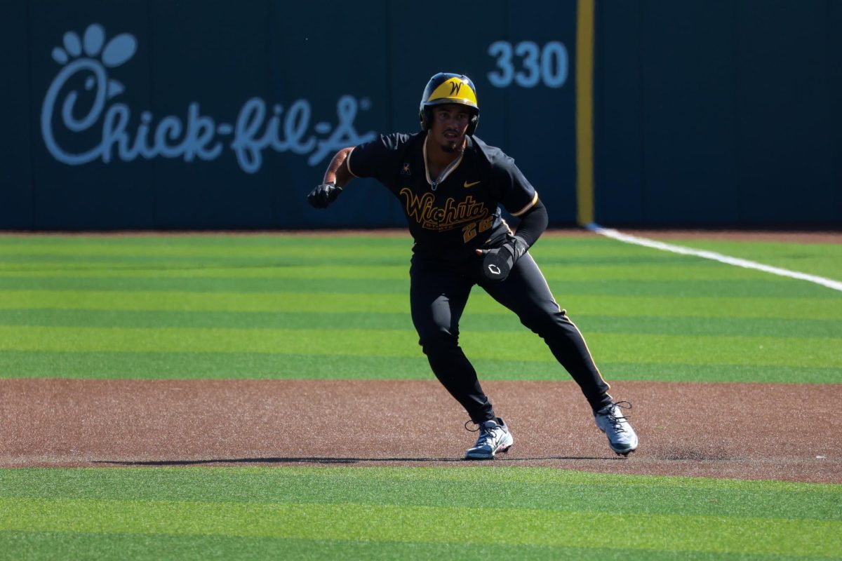 Junior Kaleb Duncan (26) takes a secondary lead at first base on Saturday, Sept. 27, 2025, at Eck Stadium in Wichita, Kansas. Duncan is one of seven returners on Wichita State's baseball team.