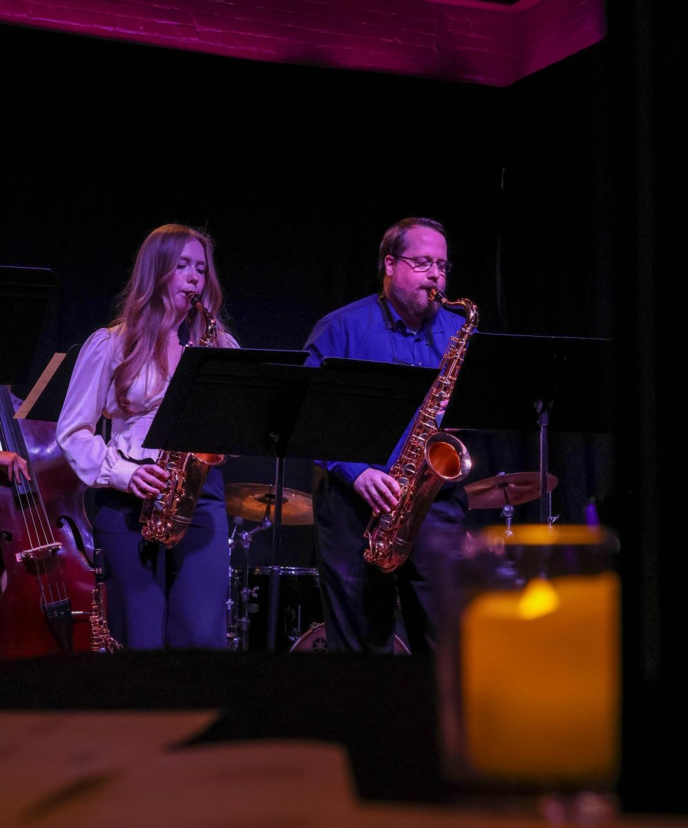 Madeline Natvig (left) and Matt Rome play saxophone at Walker's Jazz Lounge. The performance took place on Sept. 21 at 7:30 p.m.