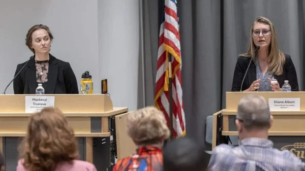 (File photo) Mackenzi Truelove, left, and Diane Albert are running for a spot on the Wichita school board. The two took part in a candidate forum at Wichita State on Tuesday, Oct. 14. 