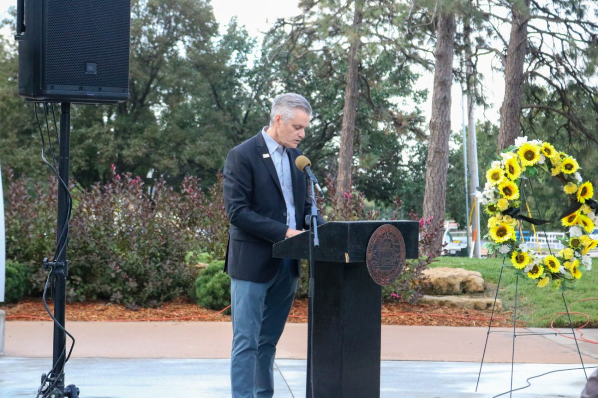 Wichita State President Ricard Muma gives opening remarks at the Memorial '70 ceremony on Oct. 2, 2025, in Wichita, Kansas. The ceremony is held annually to commemorate the WSU football team that crashed near Silver Plume, Colorado in 1970.