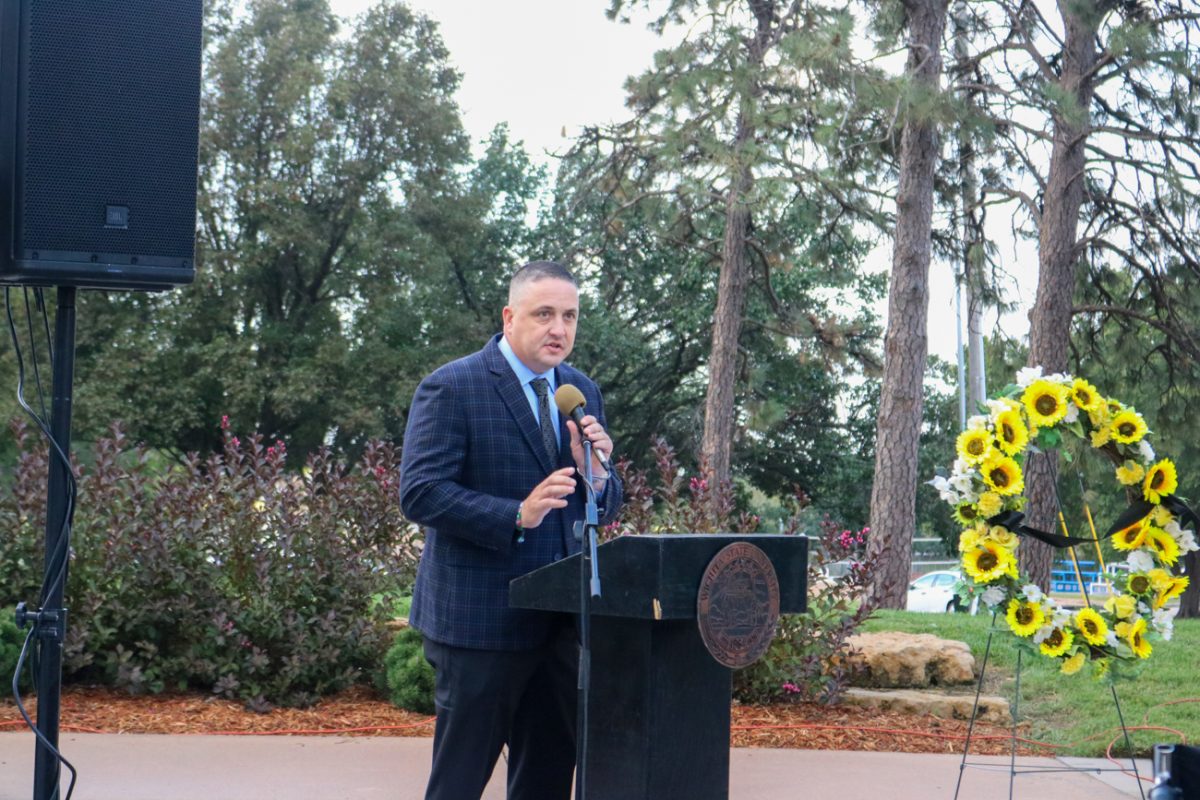 Wichita State Athletic Director Kevin Saal gives a brief history of the events surrounding the 1970 plane crash on Oct. 2, 2025, in Wichita, Kansas. Saal invited relatives to make themselves known to the audience. 