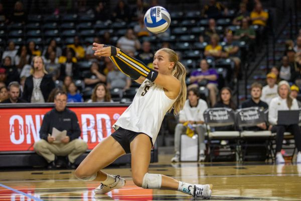 Redshirt freshman Sarah Musial (5) saves ball from hitting the floor on Friday, Oct. 3, 2025, at Koch Arena in Wichita, Kansas. Musial made four digs in the 3-1 loss against Tulsa.