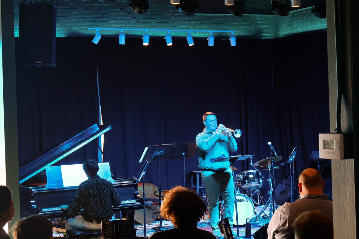 Senior Josh Bergman invites his brother, Nic Bergman, to play piano alongside him. The pair played "Stardust" by Harry James, Frank Sinatra and others.