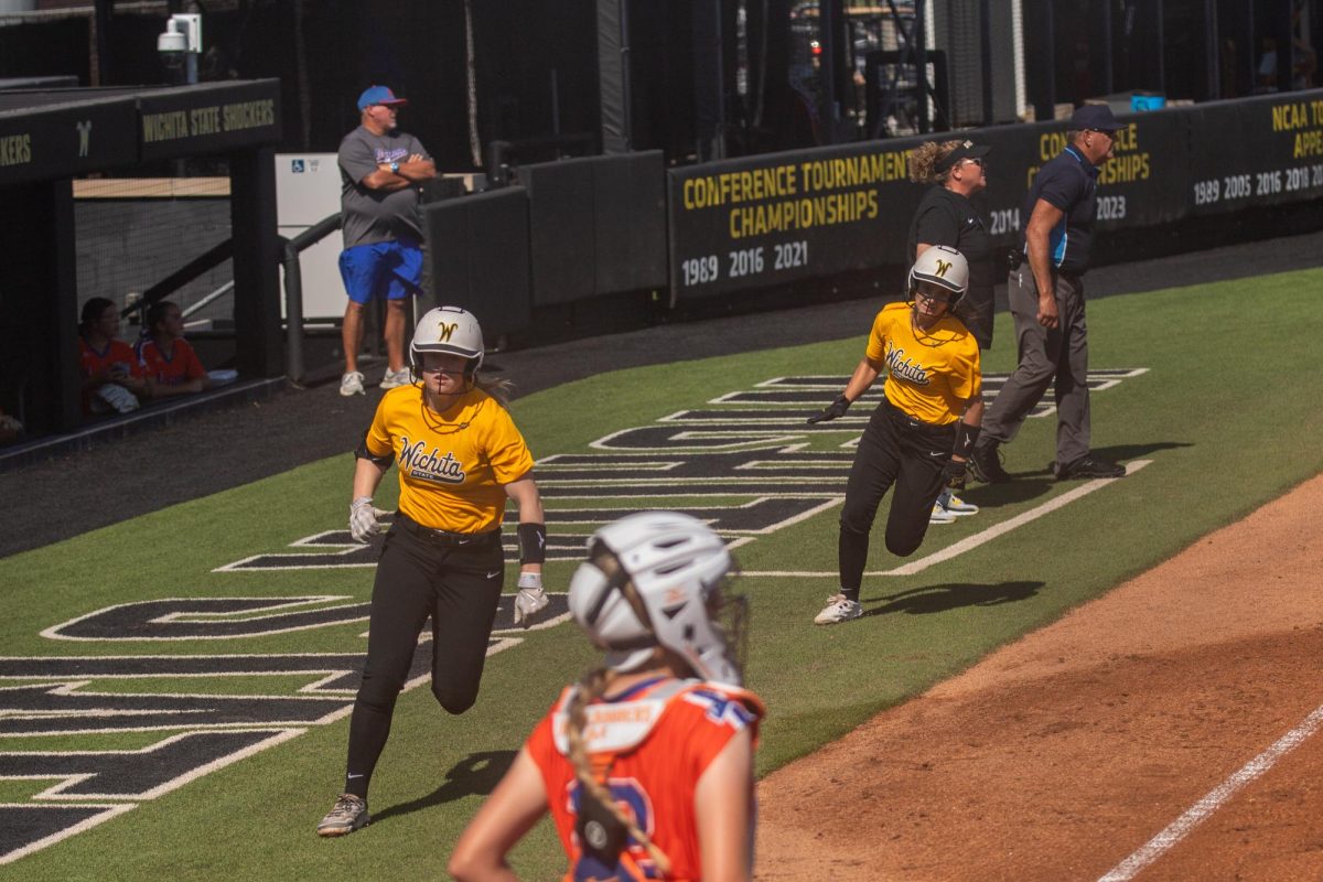 A pair of Wichita State softball players round third base during a game against McLennan Community College on Saturday, Oct. 4, 2025, at Wilkins Stadium. The Shockers won their first game of the fall season, 14-1.
