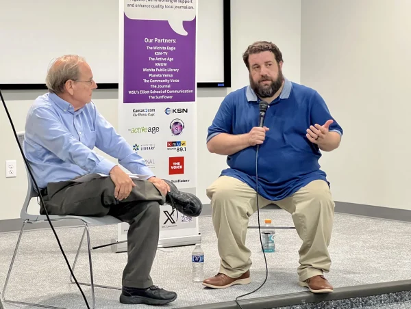 (Meg Britton-Mehlisch / KMUW) Wichita City Council member Mike Hoheisel, right, spoke with The Eagle's Dion Lefler about the issues facing the city and Hoheisel's South Wichita district during a town hall event on Oct. 2 