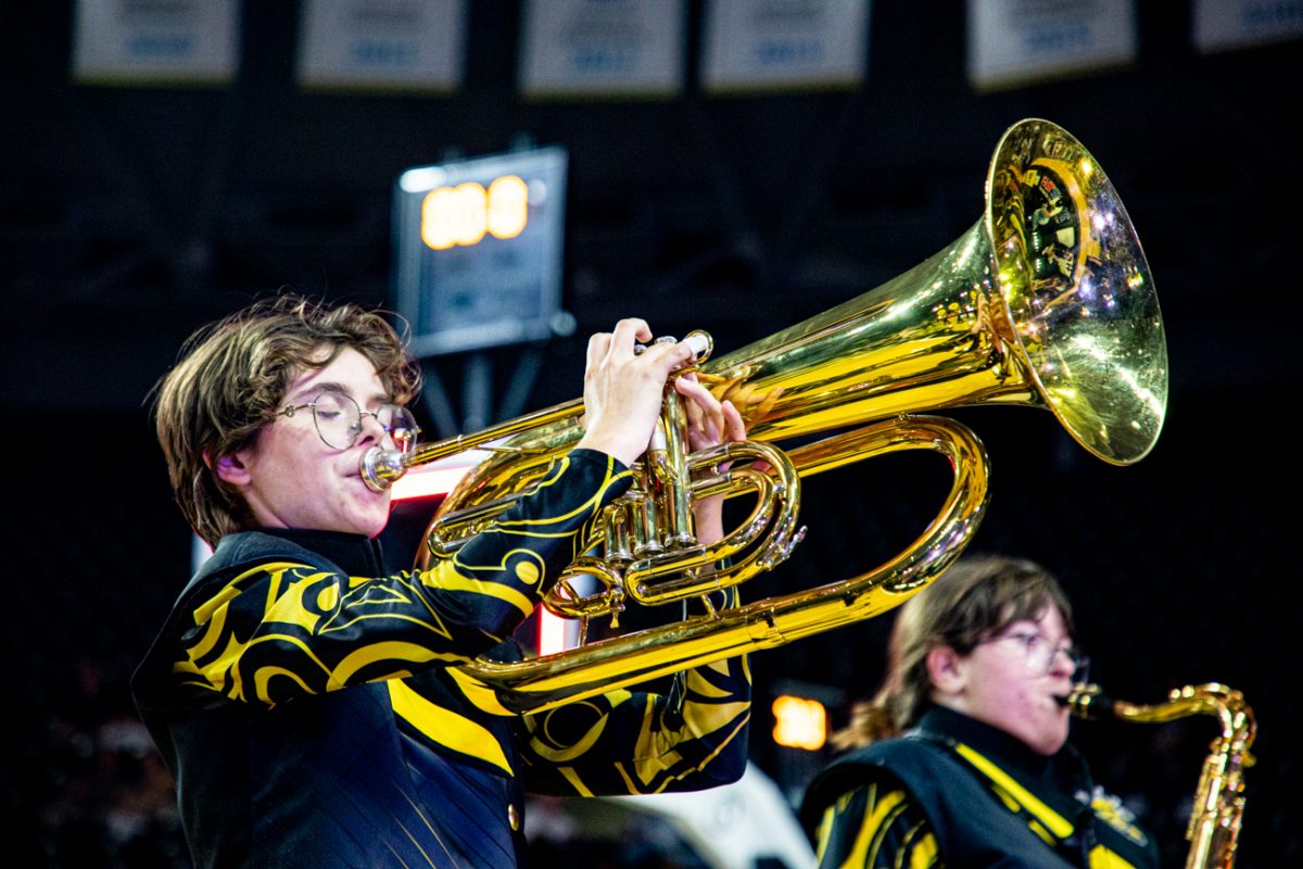 Freshman Alisa-Beth Pelletier plays with the Shocker Sound Machine during Shocker Madness. (File photo)