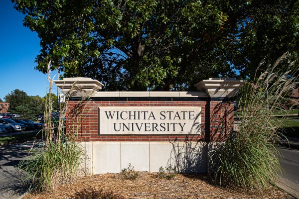 The entrance sign at the corner of Hillside Street and Memorial Drive. Similar signs are placed at multiple entrances around campus. (File photo)