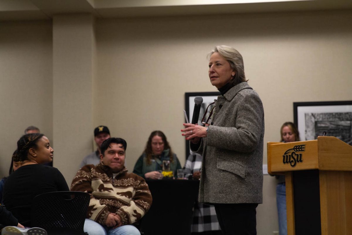 Vice President of Student Affairs Teri Hall speaks at her retirement reception. Wichita State employees inside and outside of Hall's department spoke at the reception.