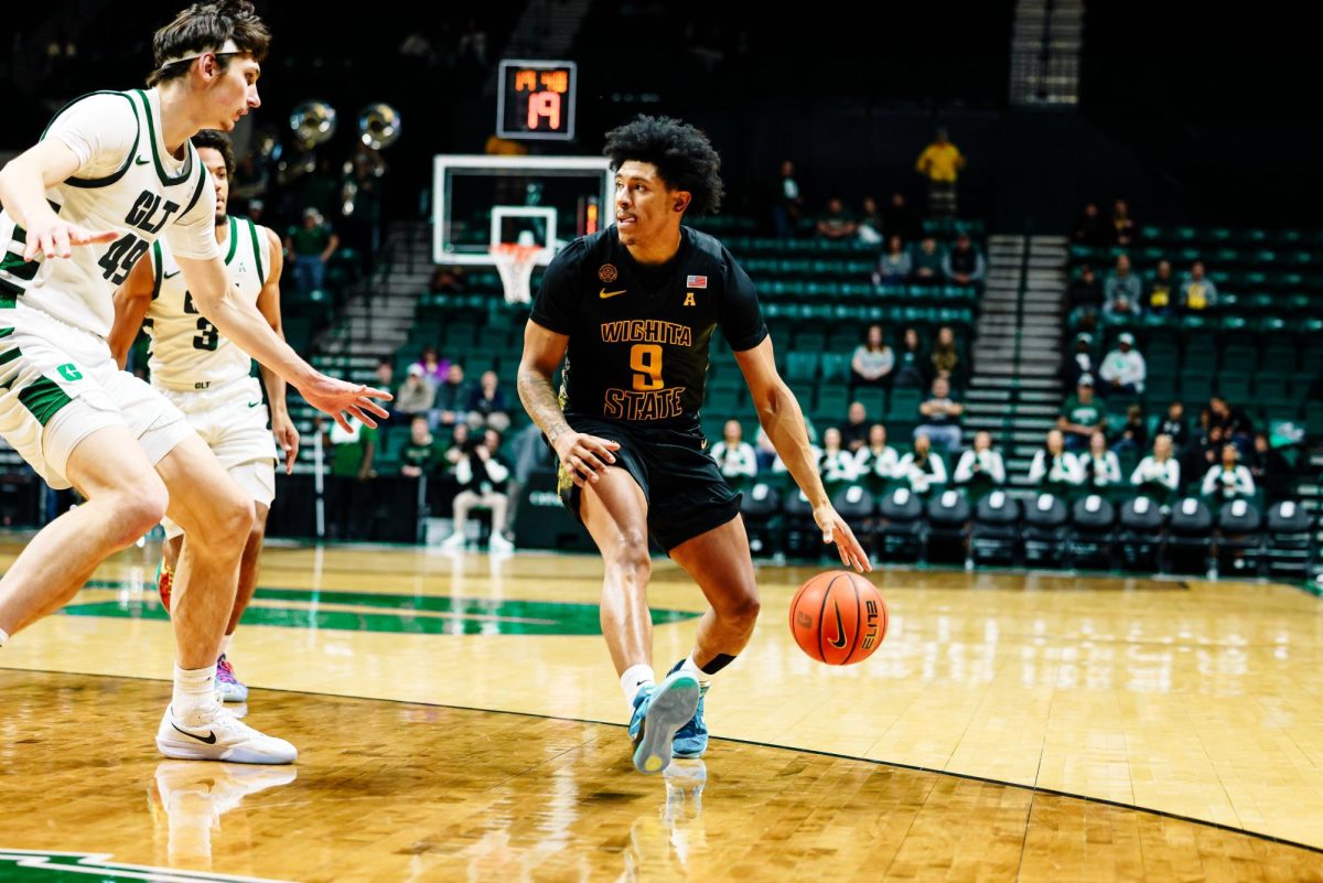 Wichita State men's basketball guard Mike Gray Jr. surveys the court against Charlotte on Jan. 3 inside Halton Arena. The Shockers let an 18-point second-half lead slip in a 104-100 double overtime loss. (Photo courtesy of Wichita State Athletics)