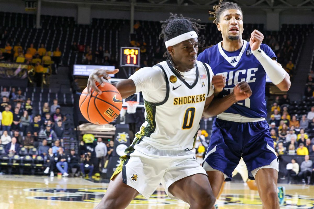Wichita State men's basketball senior forward Karon Boyd (0) muscles his way into the paint against Rice on Jan. 7. (File photo)