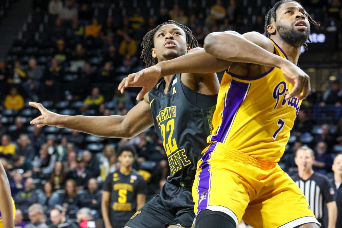 Wichita State men's basketball freshman center Noah Hill (22) establishes position for a boxout against East Carolina on Jan. 21. (File photo)