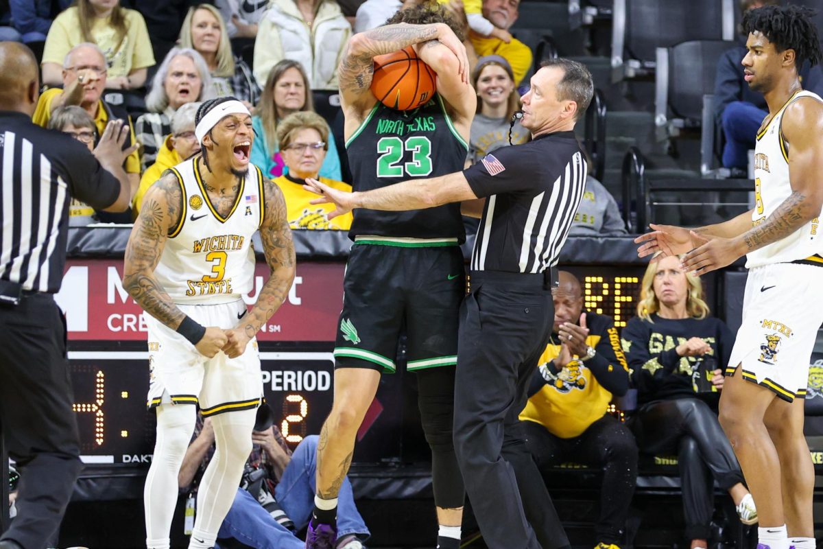 Wichita State men's basketball junior guard Dre Kindell (3) screams and flexes after forcing a turnover against North Texas on Jan. 11. (File photo)