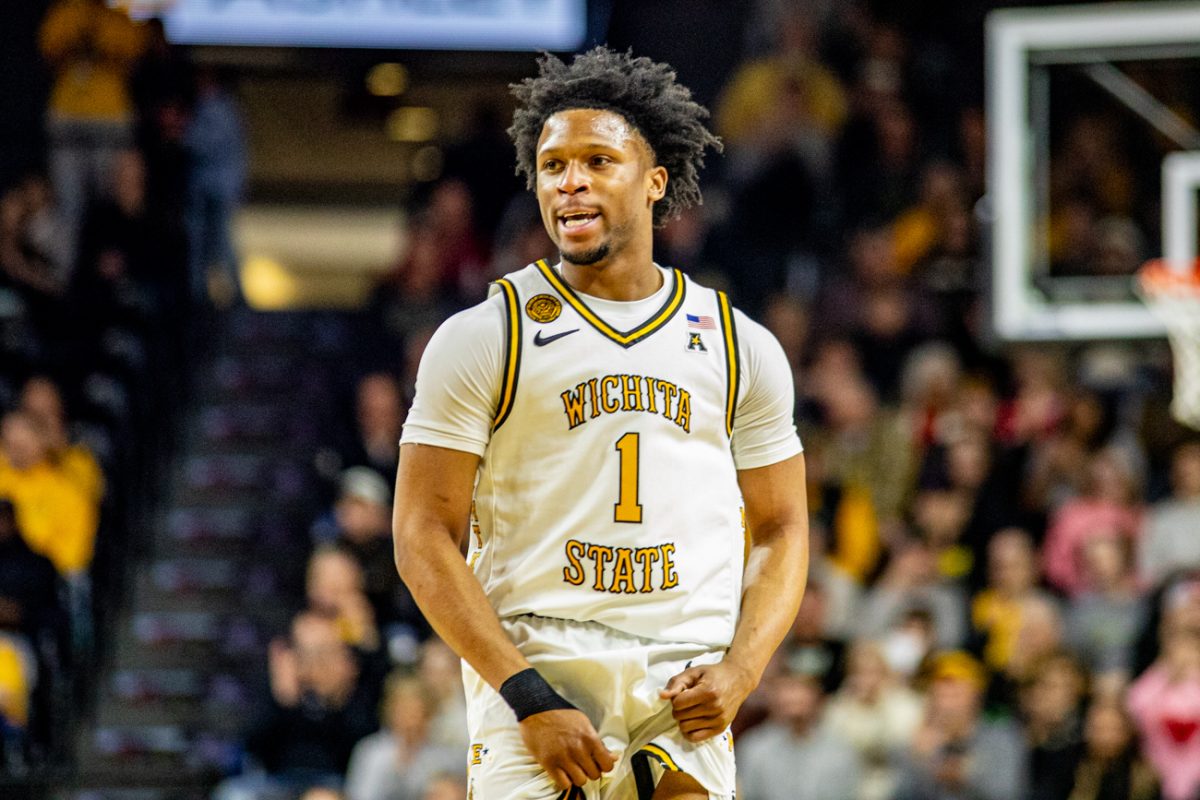 Wichita State men's basketball senior guard Kenyon Giles (1) flexes against Tulsa on Feb. 14. The Shockers led for just 2 minutes, 54 seconds during their comeback victory.