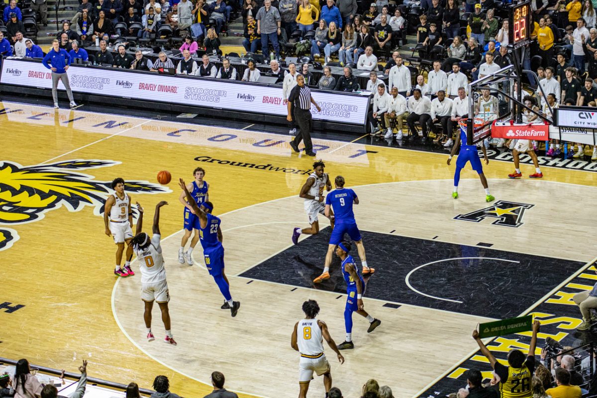 Wichita State men's basketball senior forward Karon Boyd (0) rises from the right corner for three against Tulsa on Feb. 14. The Shockers were 2-of-14 from beyond the arc but came from behind to beat the Golden Hurricane, 81-77.