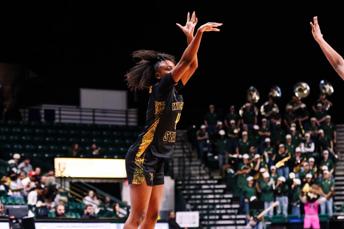 Wichita State women's basketball graduate guard Jaila Harding (4) shoots a 3-pointer against Charlotte on Feb. 7 at Halton Arena. (Photo courtesy of Wichita State Athletics)