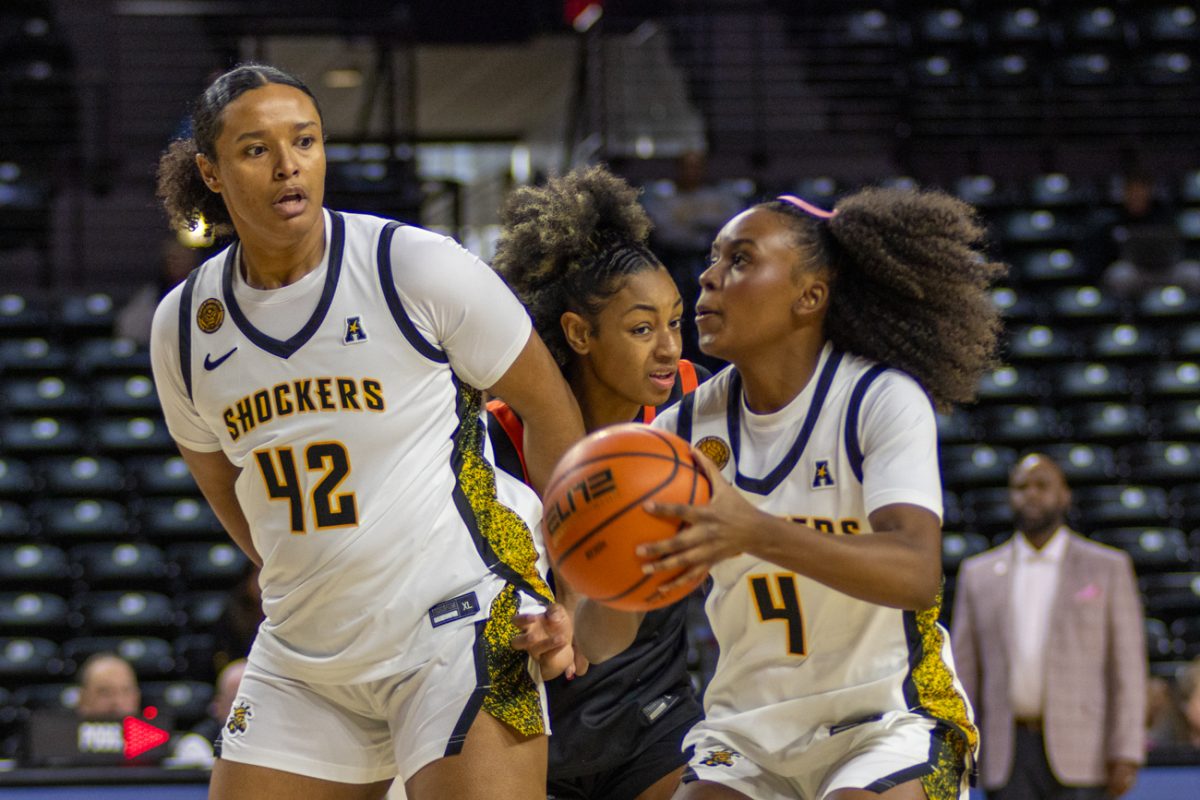 Wichita State women's basketball graduate guard Jaila Harding (4) shoots a jump shot against UTSA on Feb. 21 at Koch Arena. Harding broke the Shockers' single season 3-point record in the 62-61 win.