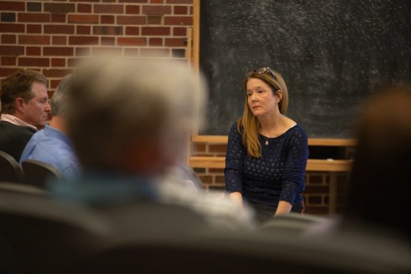 Liberal Art and Sciences Dean Sarah Beth Estes listens to an audience question at the Feb 26 LAS Townhall. The focus of the townhall was small LAS departments merging into larger departments.