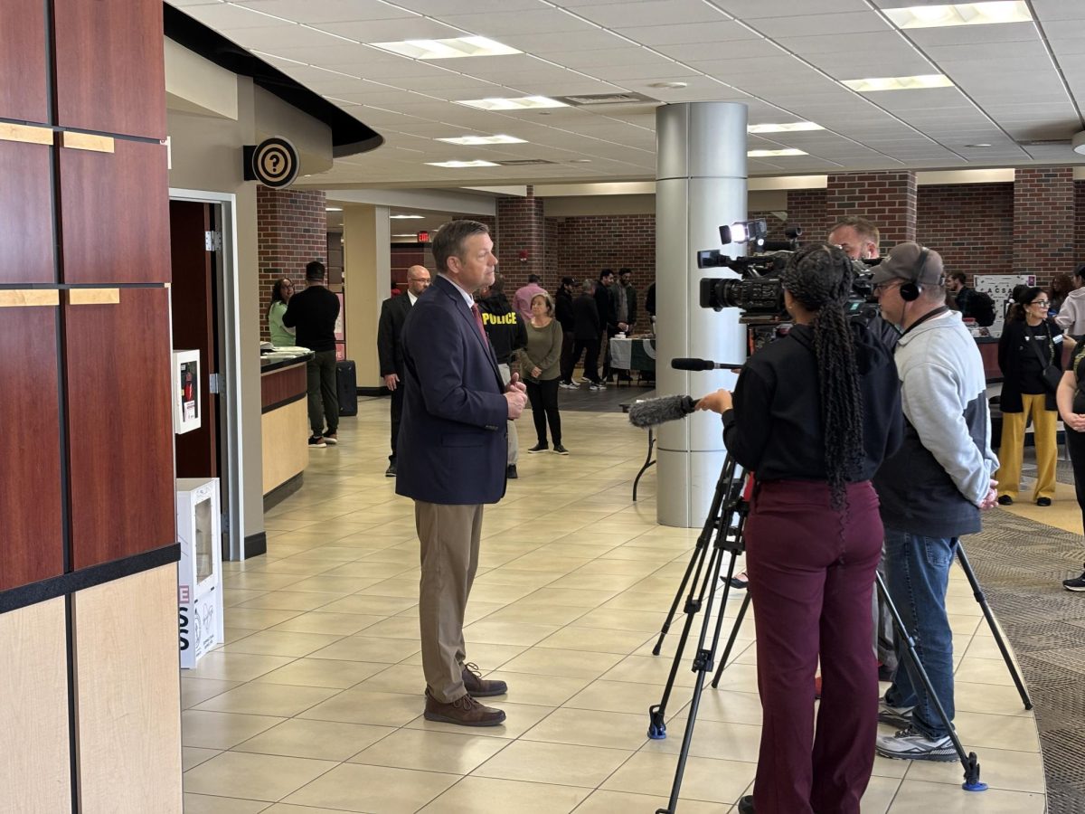 Kansas Attorney General Kris Kobach presents the newest Naloxone dispenser on Wichita State's campus. Kobach reached out to WSU wanting to deliver the dispenser personally. 