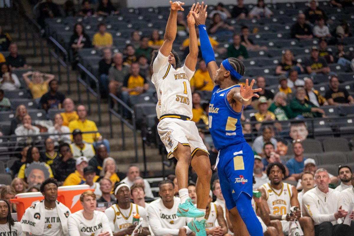 Wichita State men's basketball guard Kenyon Giles (1) shoots a 3-pointer during the second half against Tulsa during the American Conference Championship semifinals on March 14 at Legacy Arena in Birmingham, Ala. Giles drilled seven threes in the Shockers' 81-68 win.
