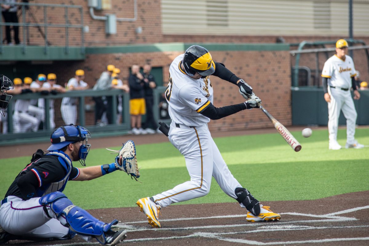 Wichita State baseball junior infielder Jayson Jones (23) swings at the ball against West Georgia on March 6 at Eck Stadium. Jones hit 2-4 with an RBI in the Shockers' win.