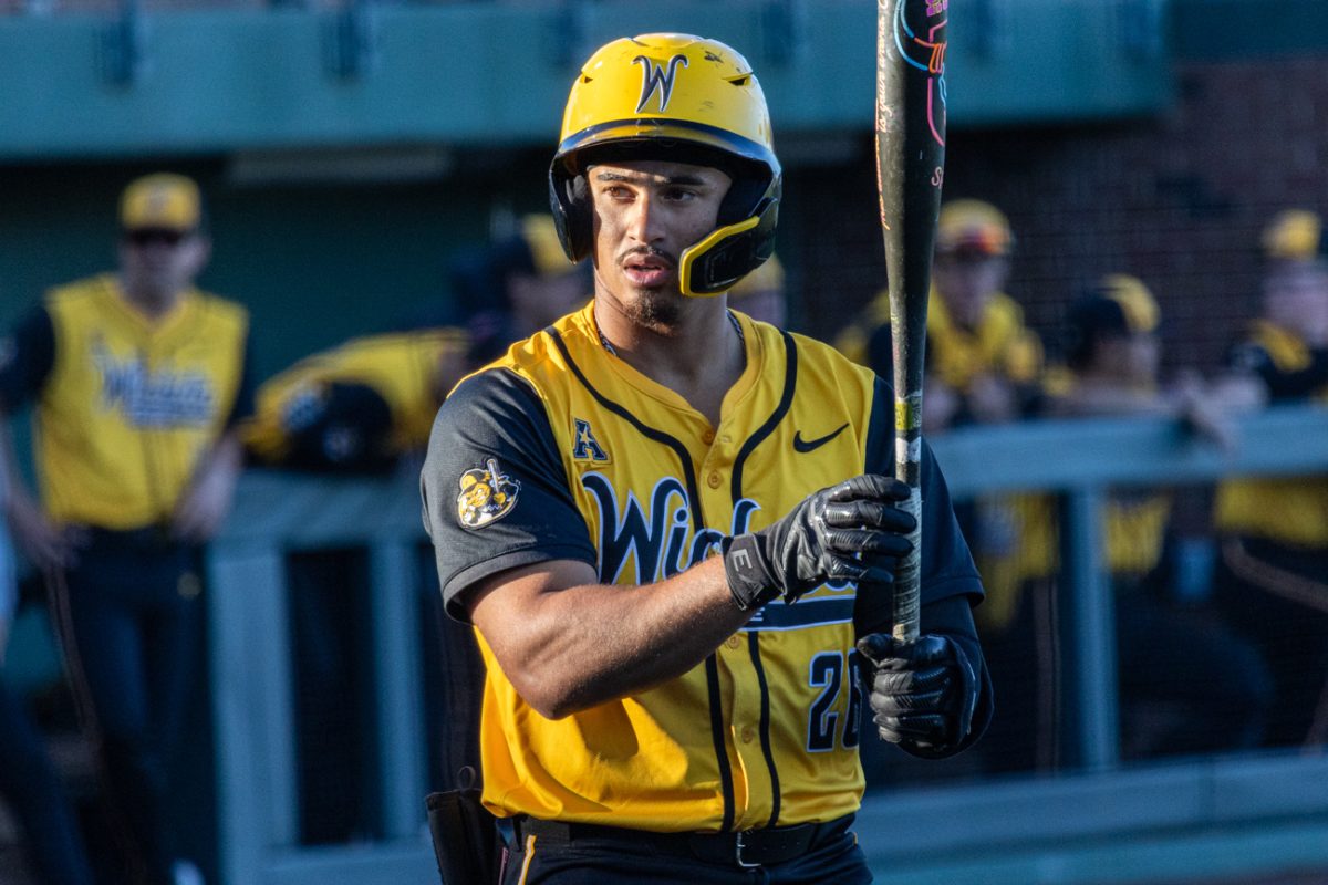 Wichita State baseball redshirt junior outfielder Kaleb Duncan (26) steps into the batter's box against Omaha on Feb. 26 at Eck Stadium. The Shockers hit 10-34 during the series-opening win.