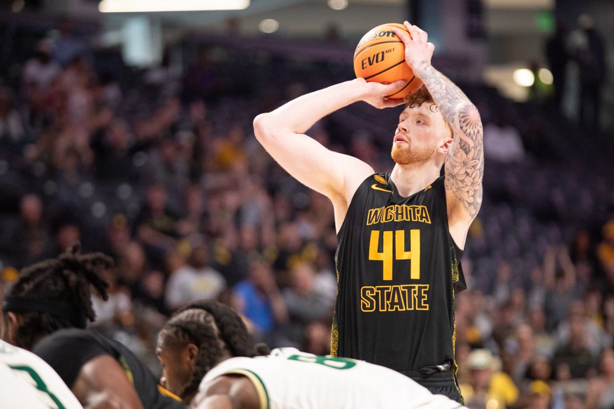 Junior center Will Berg (44) shoots for a free throw on March 15 against South Florida at Legacy Arena in Birmingham, Ala. The Shockers went 13-for-20 from the stripe against the Bulls.