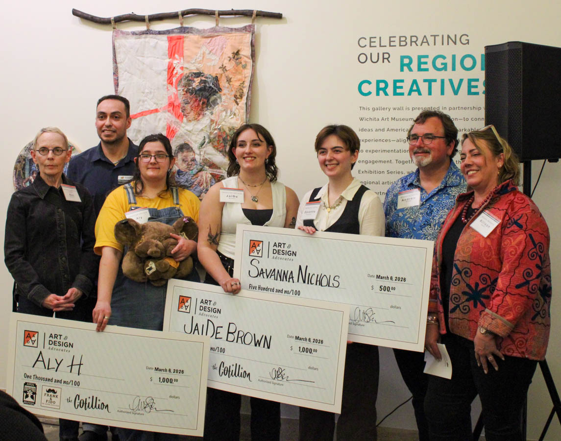 The three artists who received awards at the ShiftSpace Gallery opening reception pose with their checks. This Emerging Artists reception was the 8th annual put on by the School of Art, Design and Creative Industries.