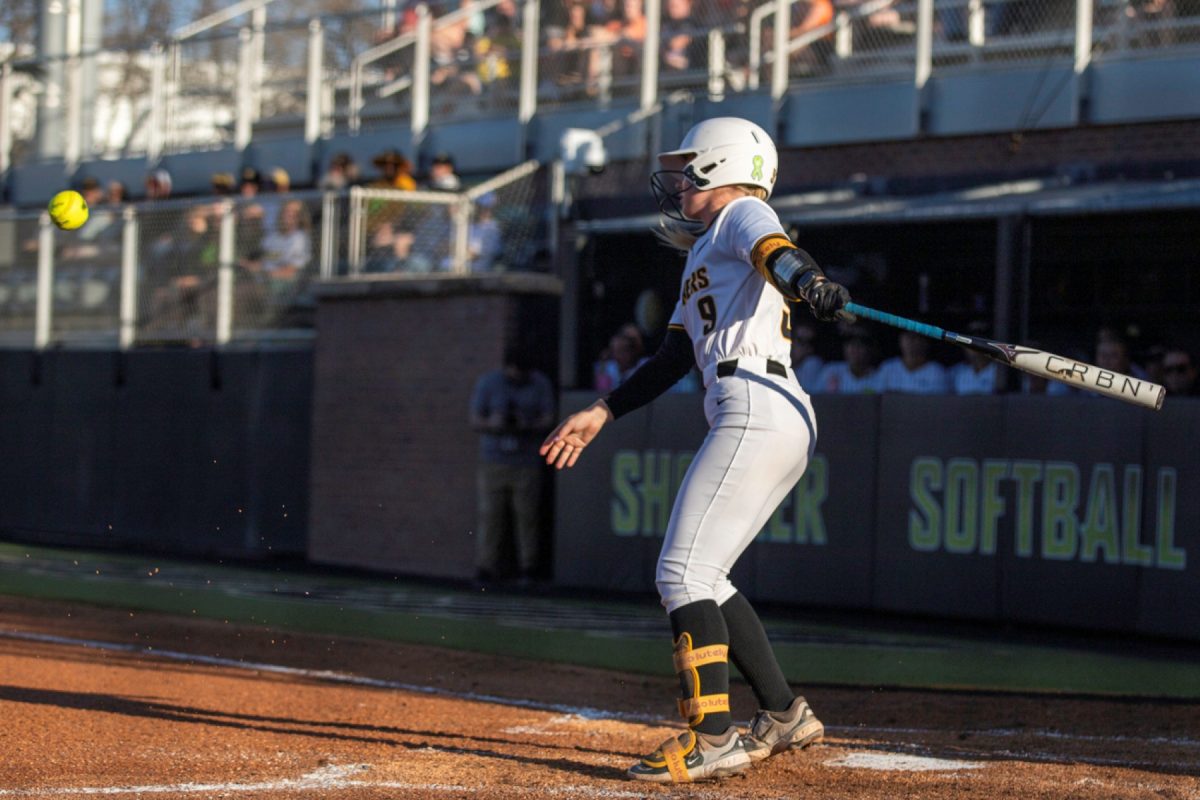 Wichita State softball freshman infielder Kammie Smith (9) swings against Florida Atlantic on March 20 at Wilkins Stadium. Smith hit 0-2 in the win.