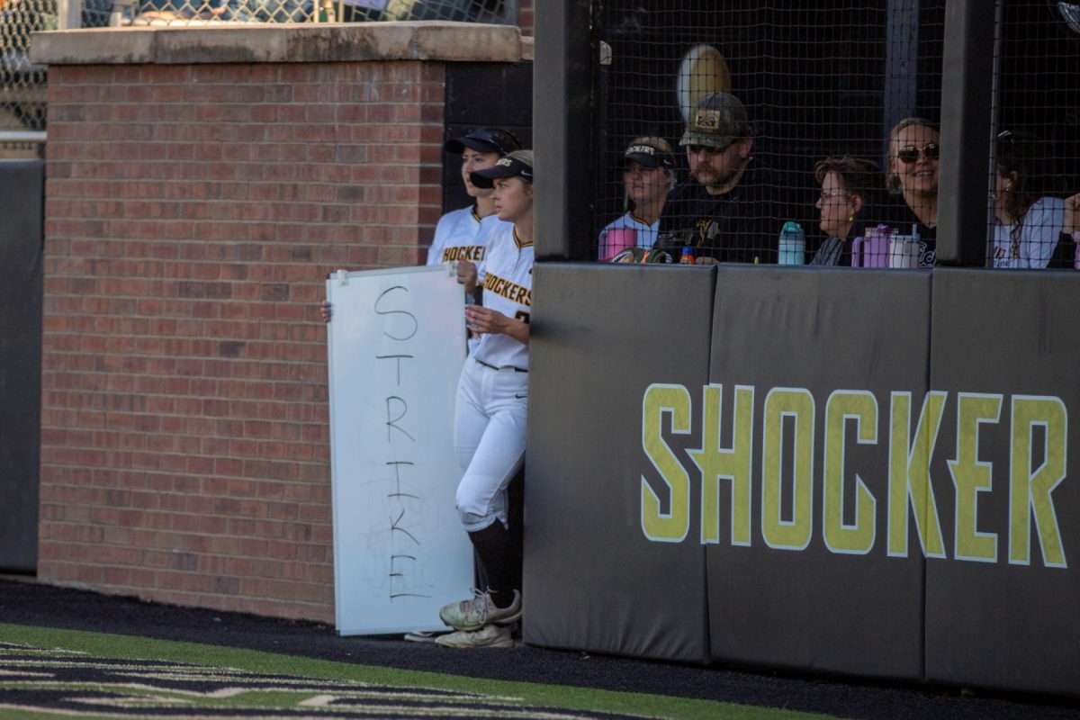 Wichita State softball team's dugout holds a sign that says "Strike" against Florida Atlantic on March 20 at Wilkins Stadium. The Shockers struck out four Owls batters in the game.