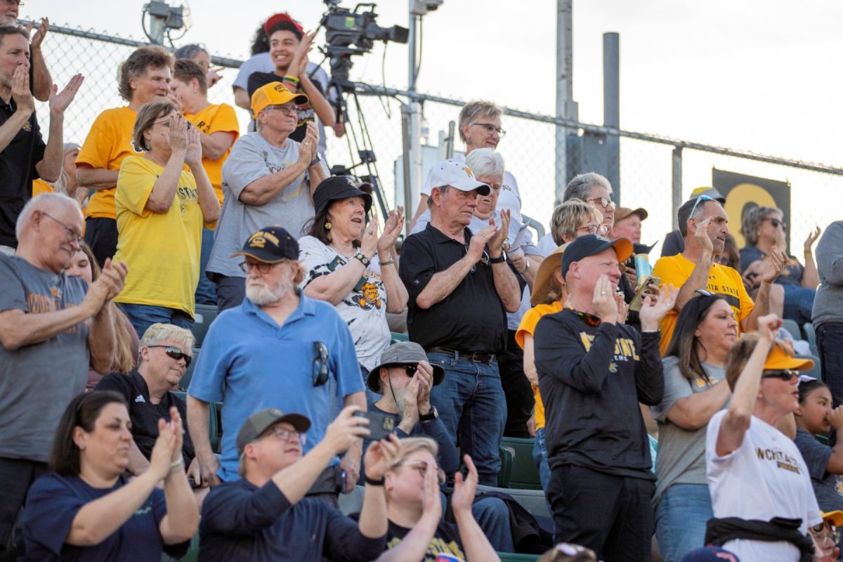 Wichita State softball fans cheer during a game against Florida Atlantic on March 20 at Wilkins Stadium. The Shockers improved to 17-10 after beating the Owls.