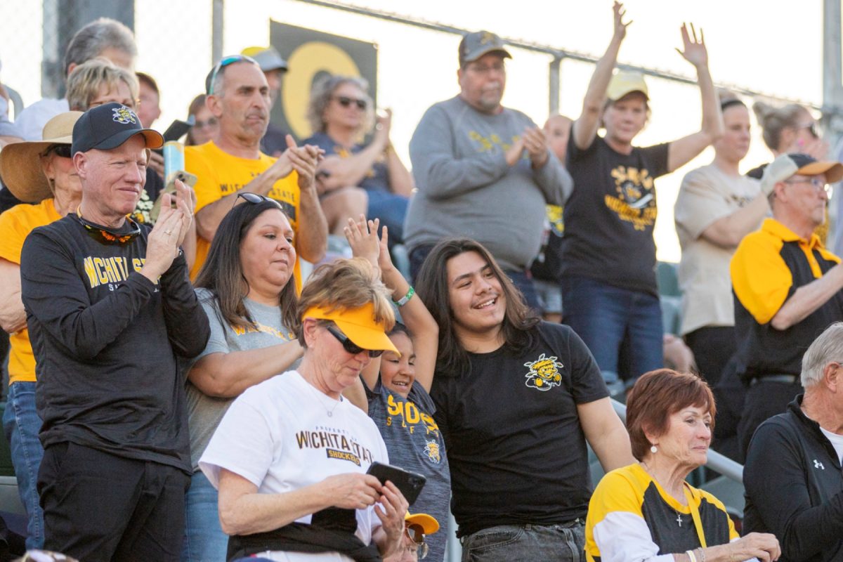 Wichita State softball fans cheer during a game against Florida Atlantic on March 20 at Wilkins Stadium. The Shockers improved to 17-10 after beating the Owls.