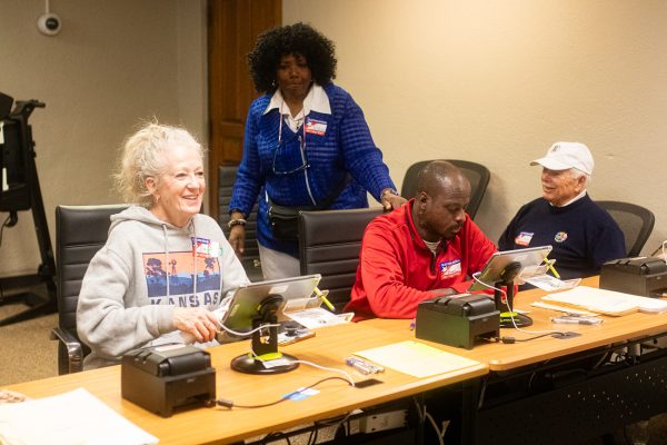Election workers wait for voters at the Sedgwick County Election Office.