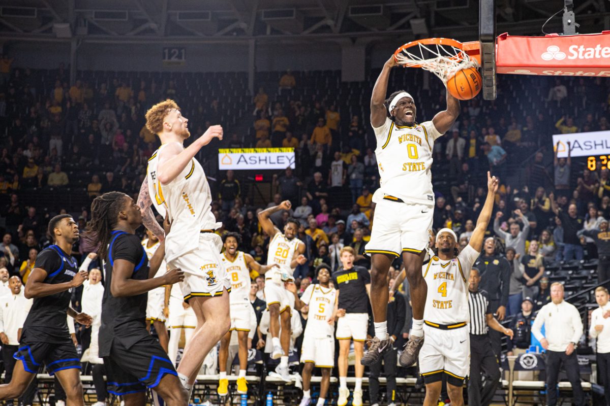 Wichita State men's basketball senior forward Karon Boyd (0) slams a dunk past the UNC Asheville defense on Nov. 4 at Koch Arena. (File photo)