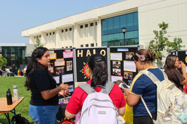 Hispanic American Leadership Organization President Lorena Favela talks about the organization to students at the 2025 involvement fair. (File photo)