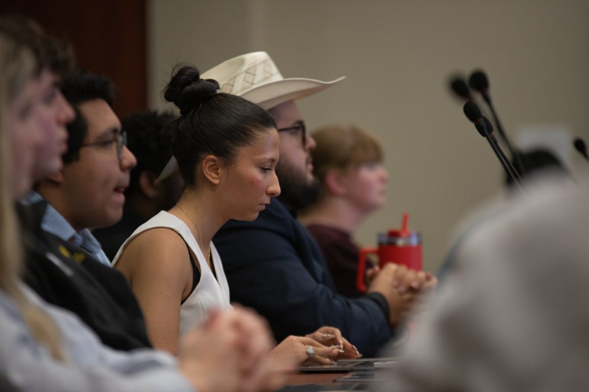 Academic Affairs Chairperson Nazanin Kasirosafar listens as legislation is presented at a weekly Student Senate meeting. (File photo) 