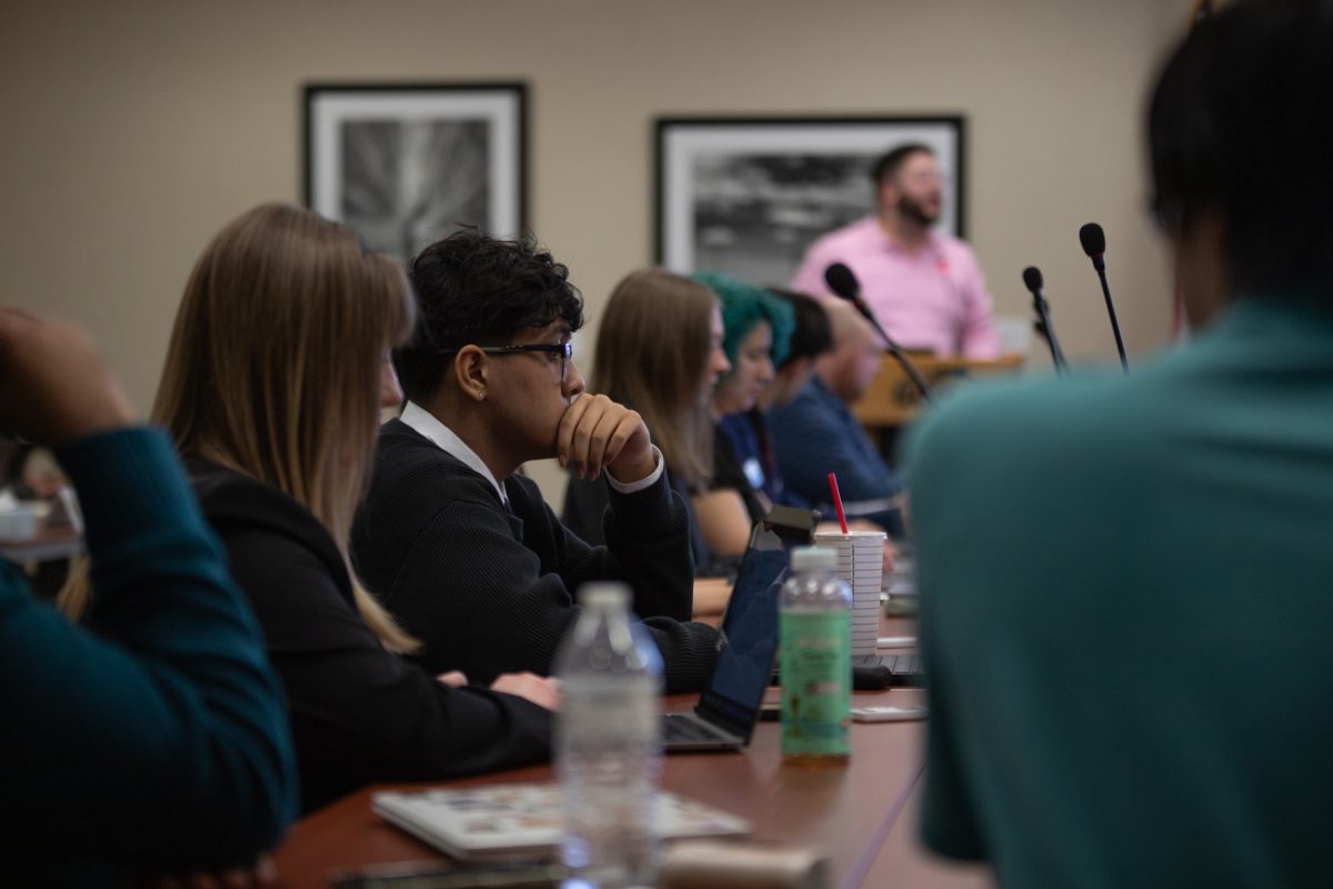 The Student Senate listens as SGA Advisor Gabriel Fonseca gives his Central Office report. 