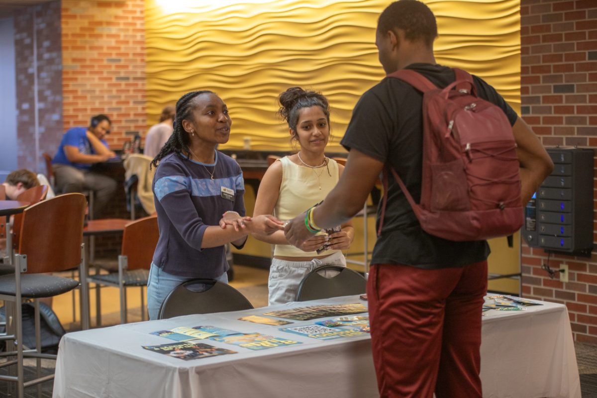 Jayden Island, left, and Anoushka Raju table for their student body presidential and vice presidential campaign. Island is running for president and Raju for vice president.