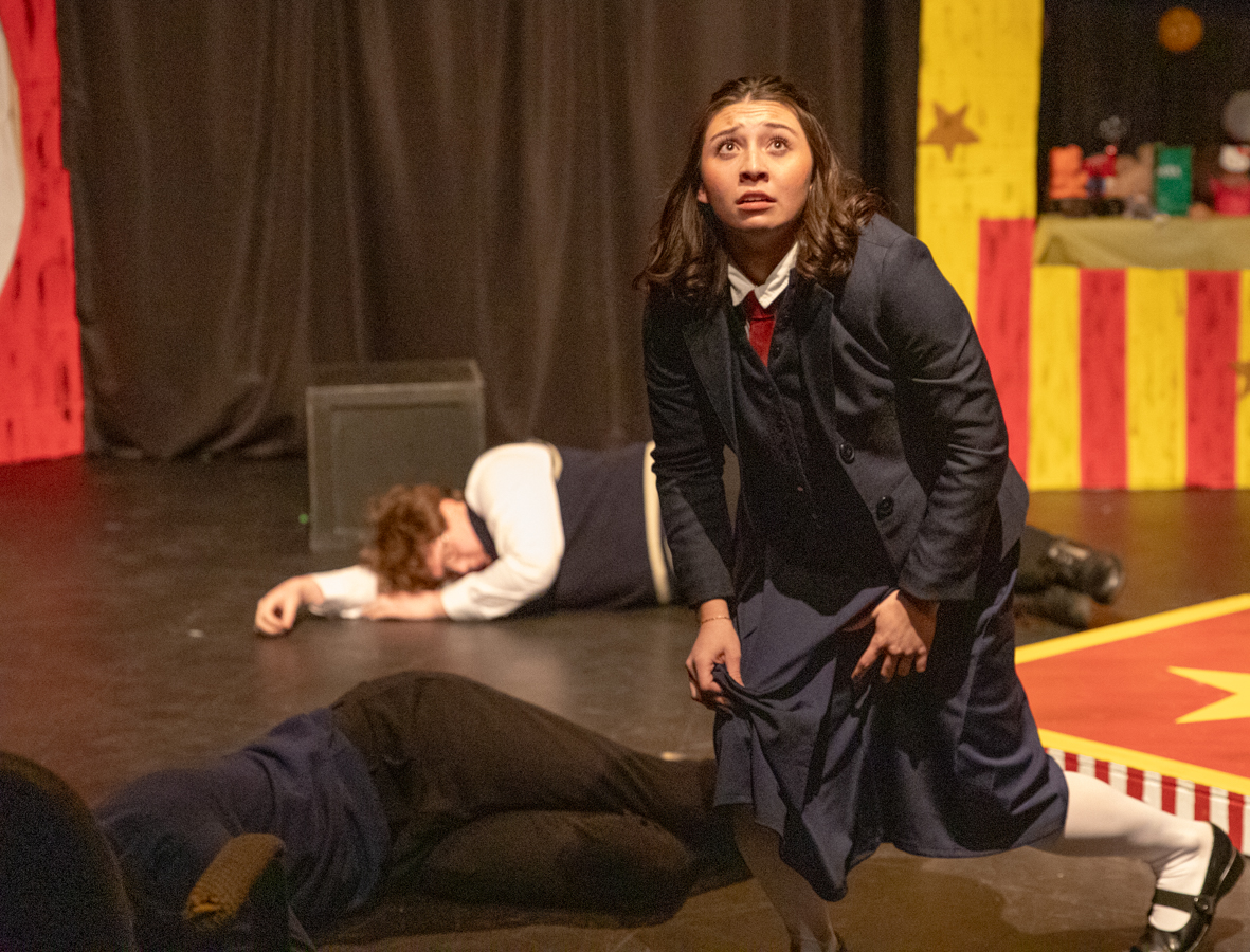 Sophia Fruits stands up apprehensively after falling to the ground. Fruits played Ocean O'Connell Rosenberg in "Ride the Cyclone."