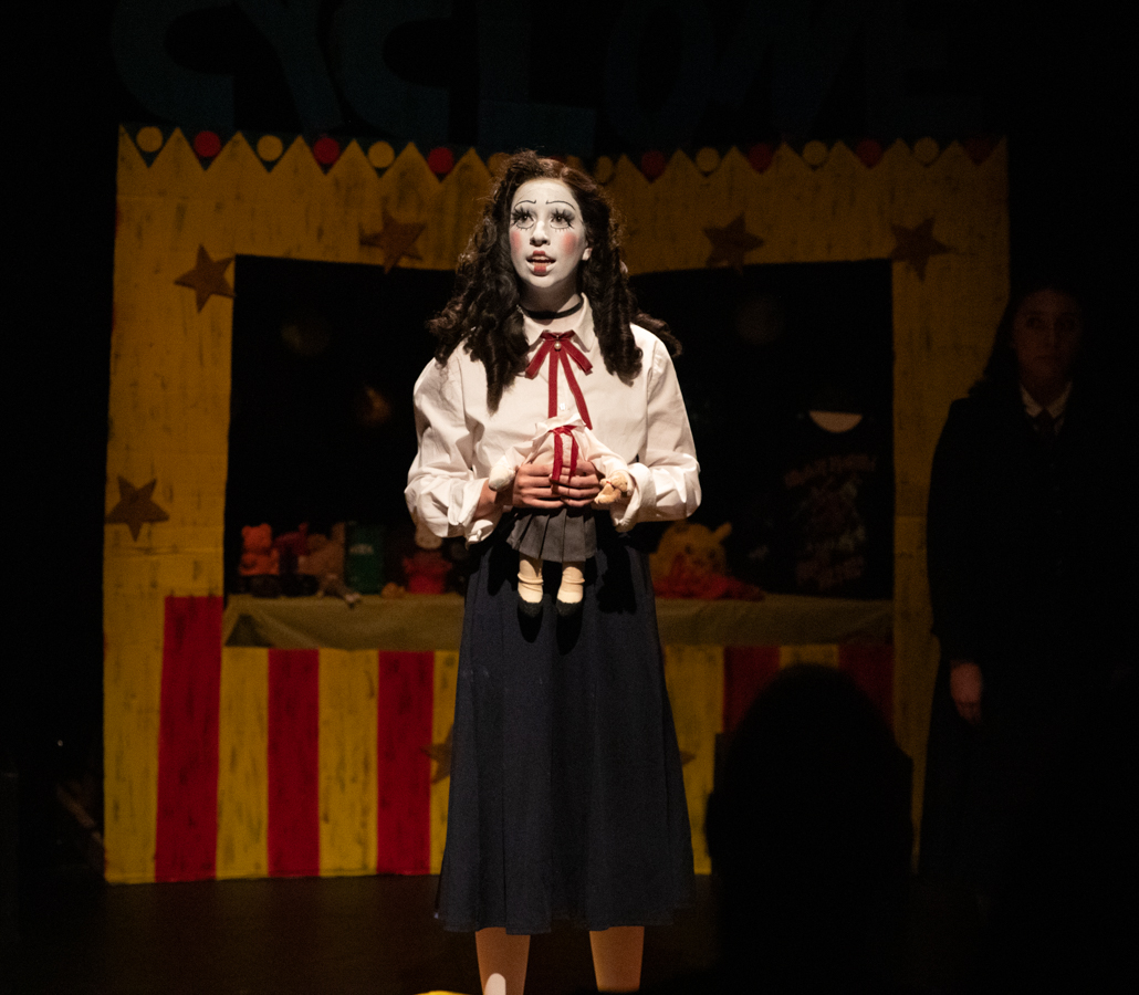 Aubrey Johnson holds a headless doll while telling her backstory is revealed. Johnson played Jane Doe, the nameless victim of the Cyclone accident.