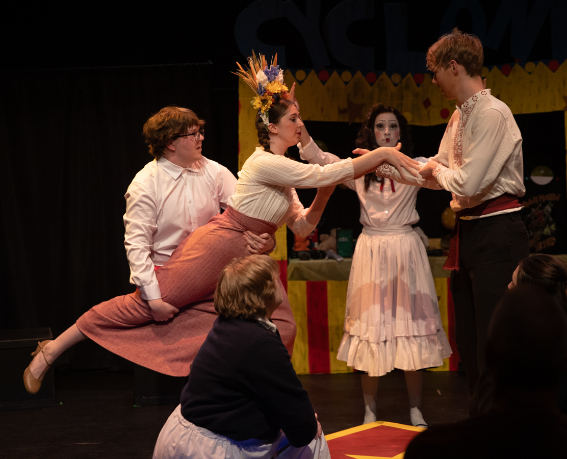 Sebastian McGinity-Kinderknecht tries to hold on to Audrey Jagodzinske as Connor Harris pulls her away. Jagodzinske played Talia during McGinity-Kinderknecht second solo, "Talia."